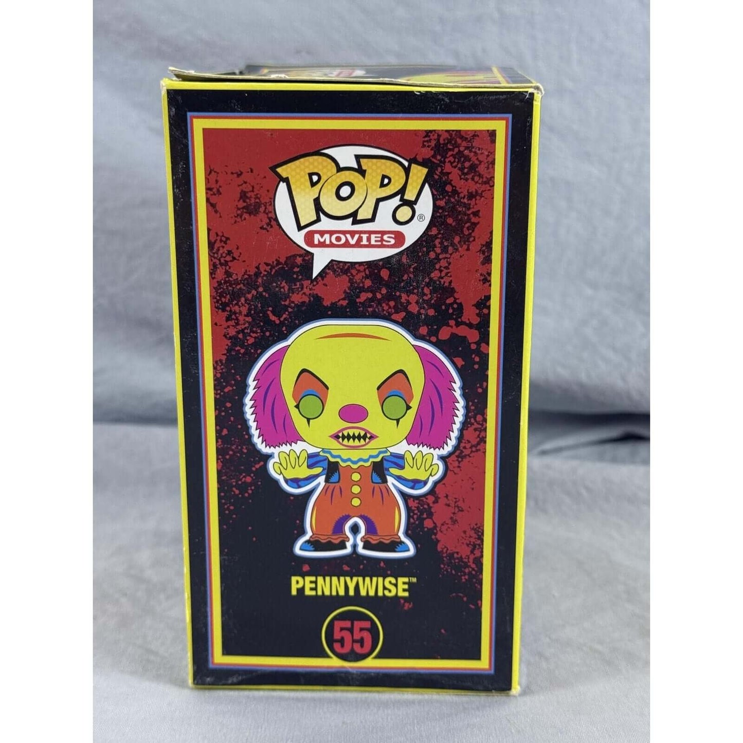 Pennywise #55 from IT (Blacklight) Entertainment Earth Exclusive Funko Pop!