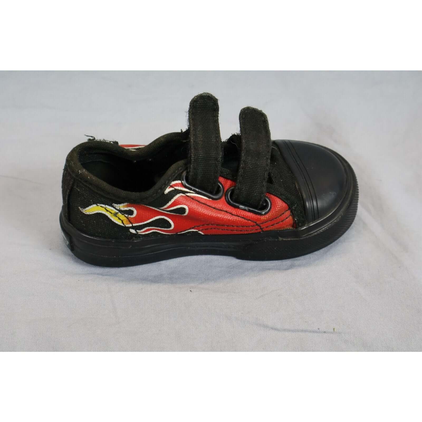 Vans Shoes Toddler Size 5 Black Red Flame Skate Low Top Rubber Toe side view with black flames and red panels